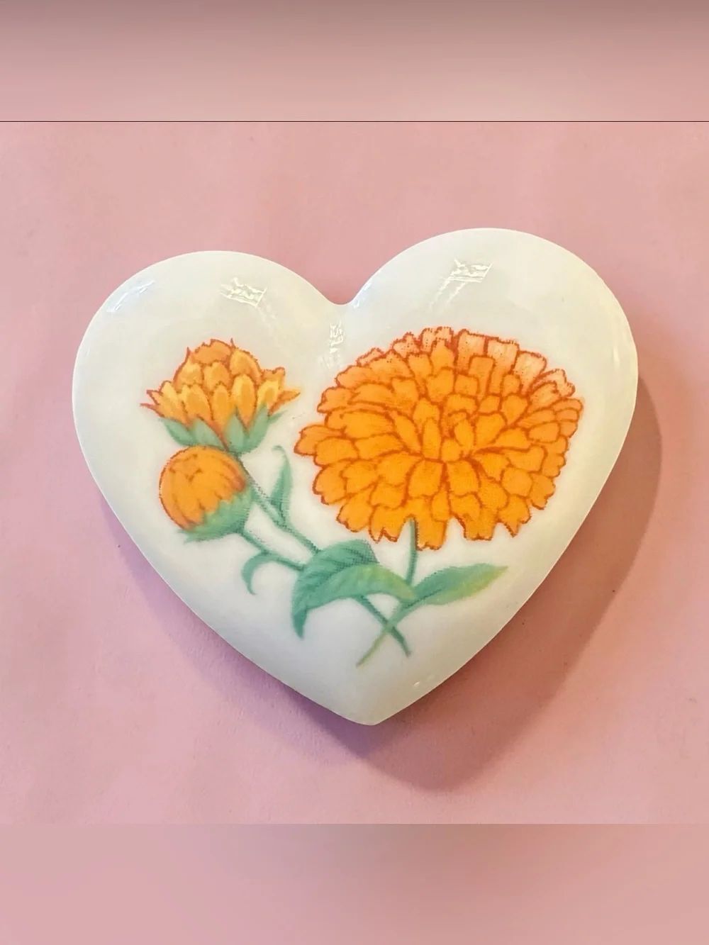 Vintage Avon Heart-Shaped Ceramic Brooch with Orange Marigold Design